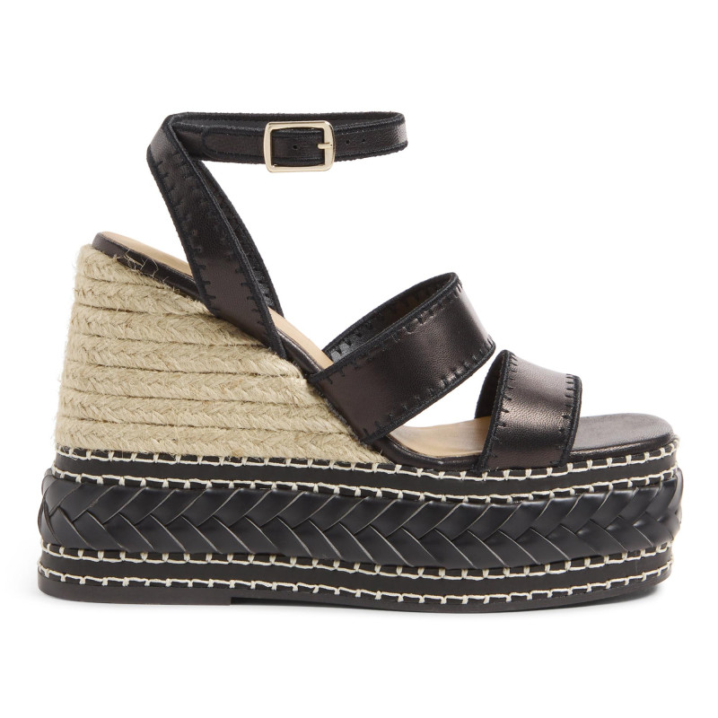 Sandalias Faure en piel, cierre lateral de pulsera con hebilla metálica.