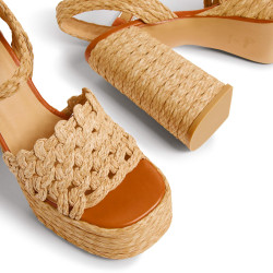 Sandalias Faye en rafia, cierre lateral de pulsera con hebilla metálica.